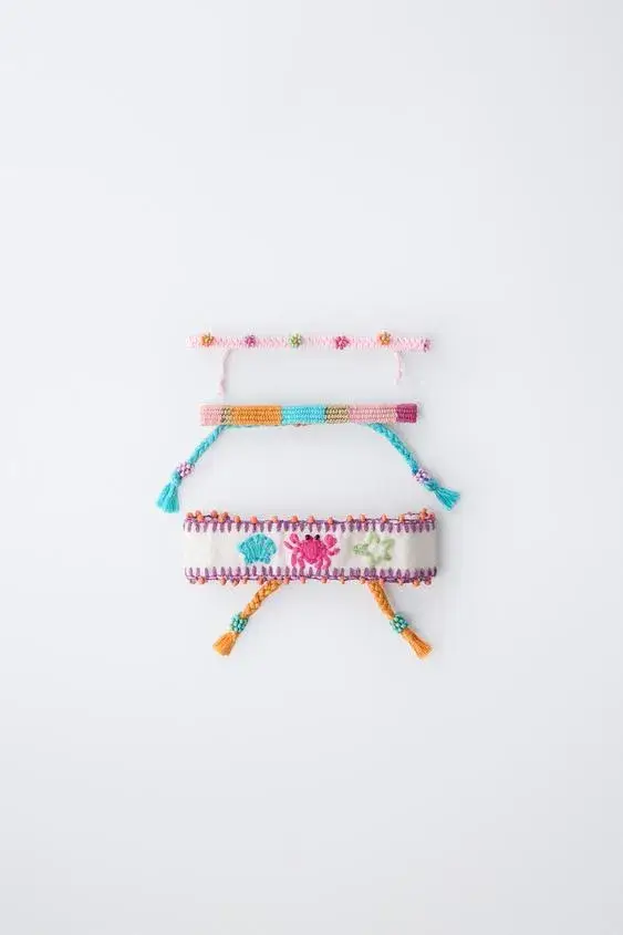 THREE-PACK OF EMBROIDERED AND BEADED BRACELETS