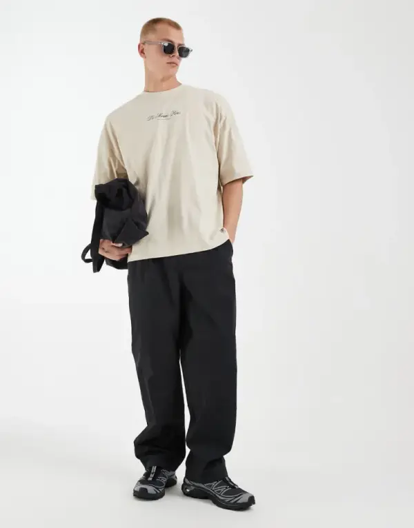 ASOS DESIGN oversized T-shirt with tennis sports graphic in beige