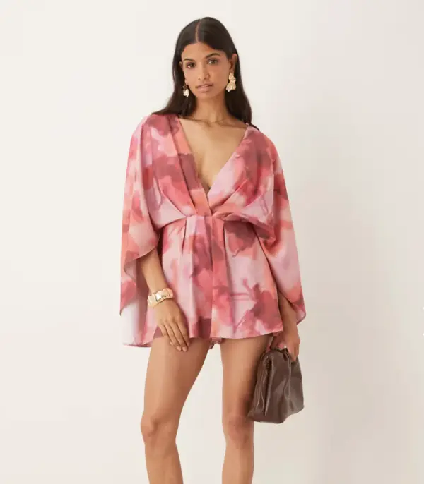 ASOS DESIGN exaggerated sleeve plunge romper in soft floral print