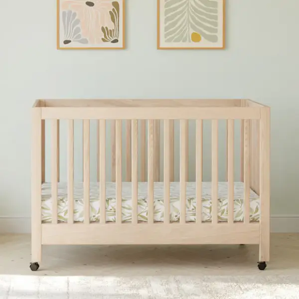 babyletto Maki Portable Folding Crib with Toddler Bed Conversion Kit - Washed Natural