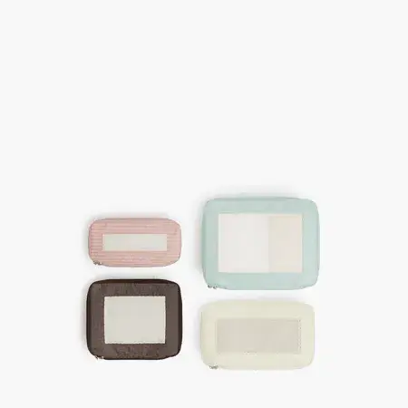 Monos × Reformation Compressible Packing Cubes